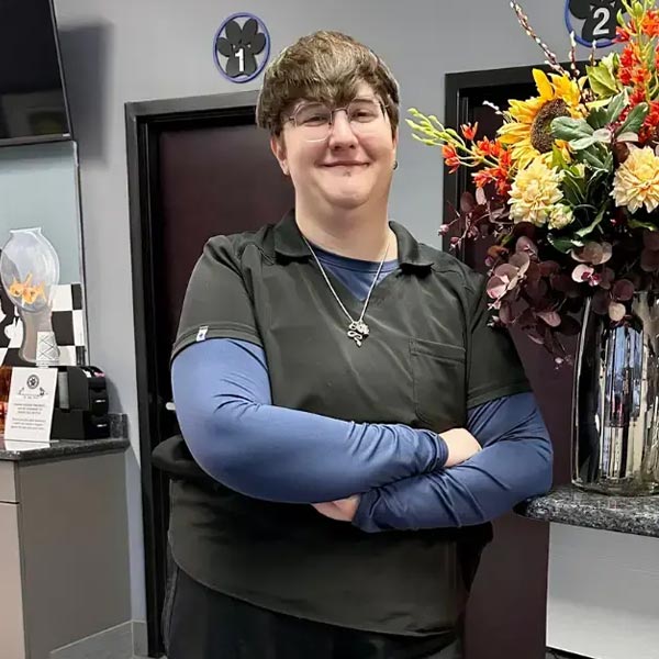 Liz smiling and posing